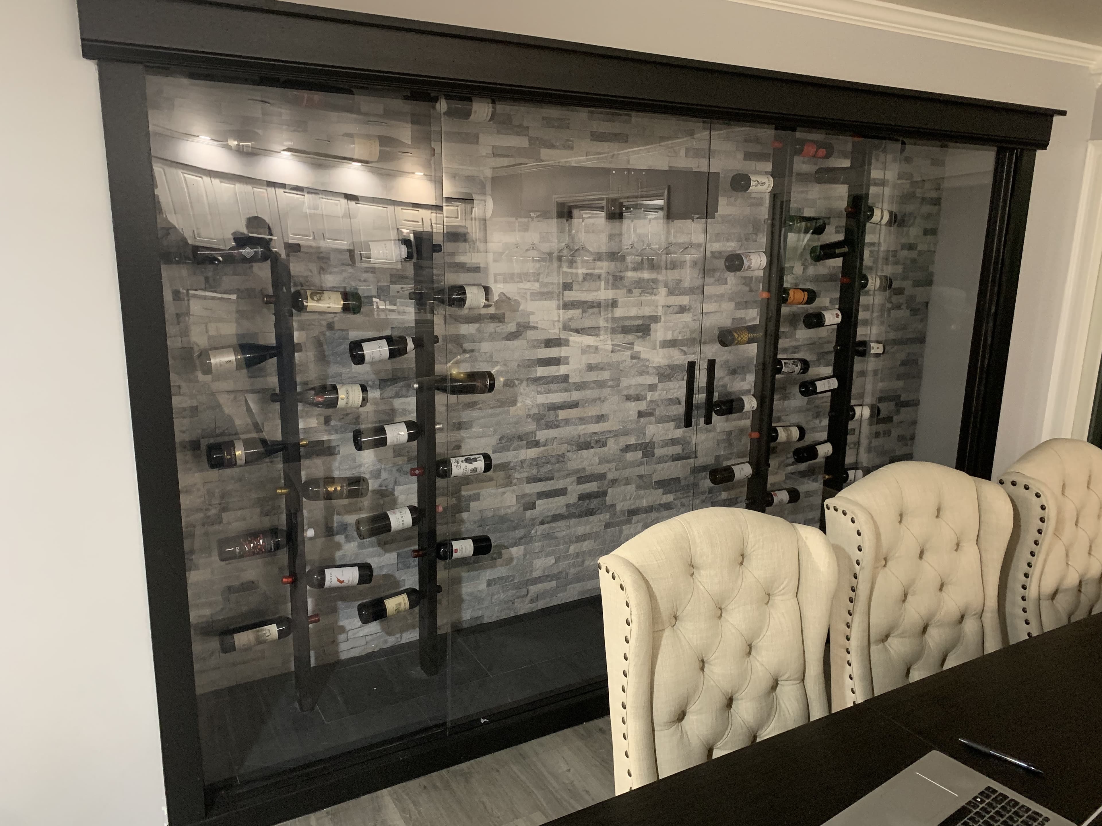 White board and batten accent wall in a dining room