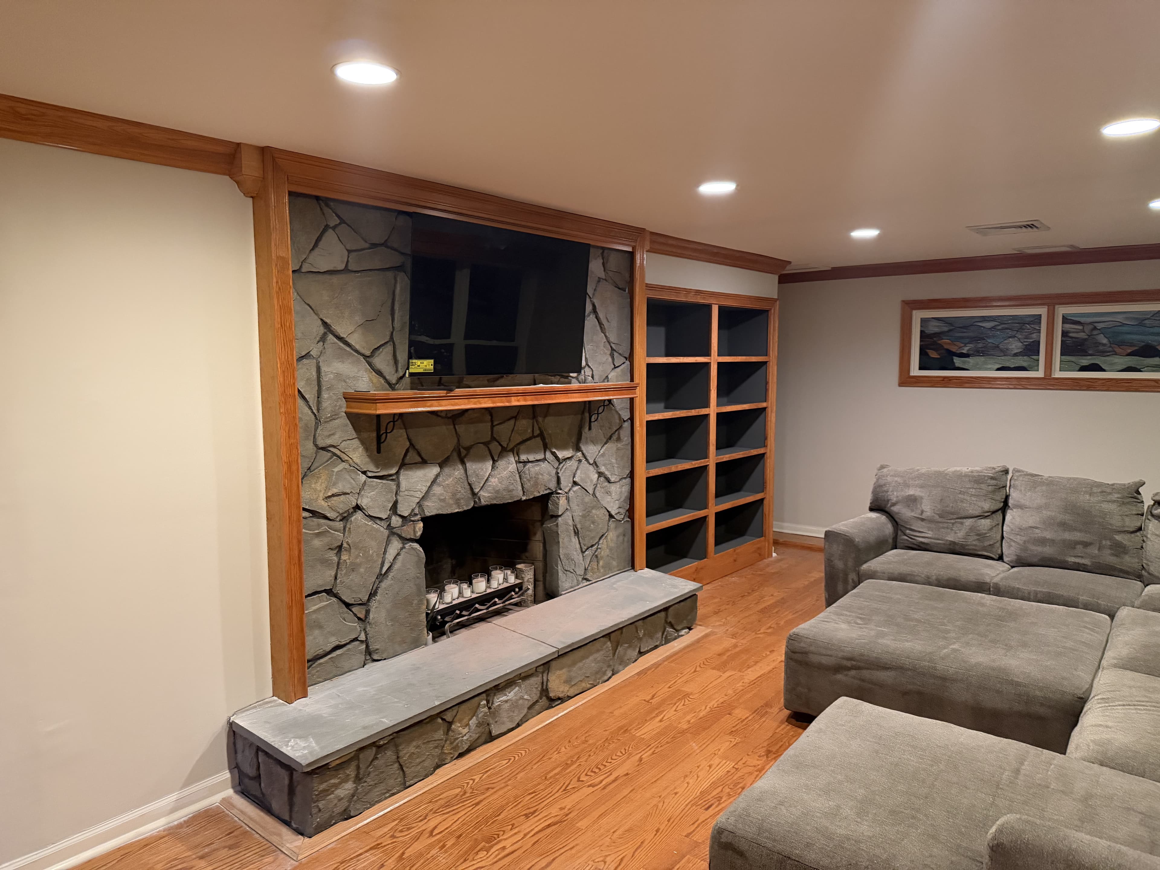 Odds & Ends mounting a 65-inch TV on a brick fireplace wall